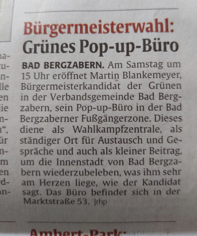 Grünes Pop-up-Büro zur Bürgermeisterwahl in Fußgängerzone